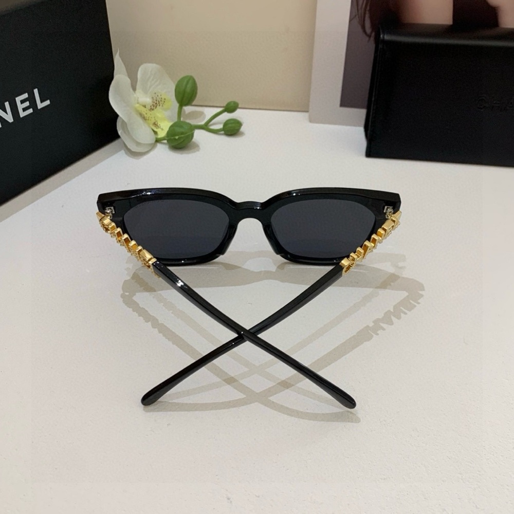 CHANEL Black Sunglasses with Gold Detailing - Picture 3 of 8
